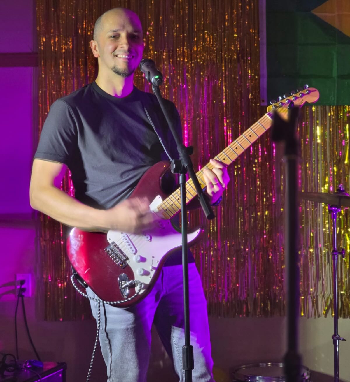 Guitarist Diego performing with JBJ
